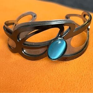 Laser Cut Silver Cuff Bracelet with Blue Stone